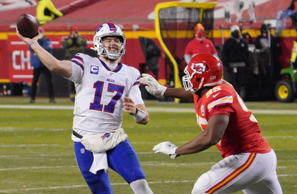 Bills quarterback Josh Allen (17) is pressured by Kansas City Chiefs defensive tackle Chris Jones (95) during the third quarter of the AFC Championship Game at Arrowhead Stadium.