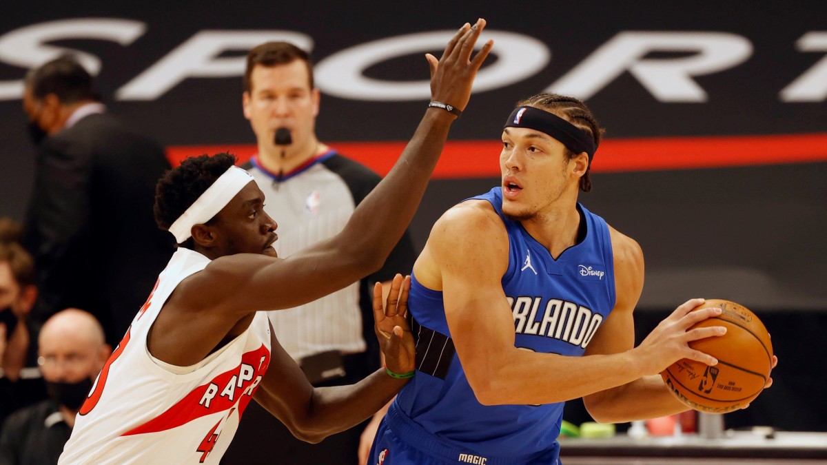 Orlando Magic forward Aaron Gordon (right) drives to the basket against Toronto Raptors forward Pascal Siakam (43) during the first quarter at Amalie Arena.
