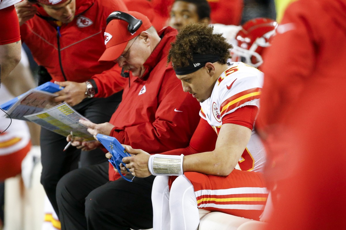 Dec 23, 2018; Seattle, WA, USA; Kansas City Chiefs quarterback Patrick Mahomes (15) and head coach Andy Reid sit on the bench during the third quarter against the Seattle Seahawks at CenturyLink Field. Mandatory Credit: Joe Nicholson-USA TODAY Sports