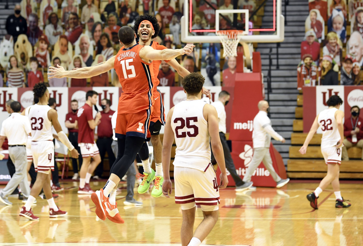 Illinois Fighting Illini guard Andre Curbelo (5) and forward Giorgi Bezhanishvili (15) celebrate on the court after defeating the Indiana Hoosiers at Simon Skjodt Assembly Hall.