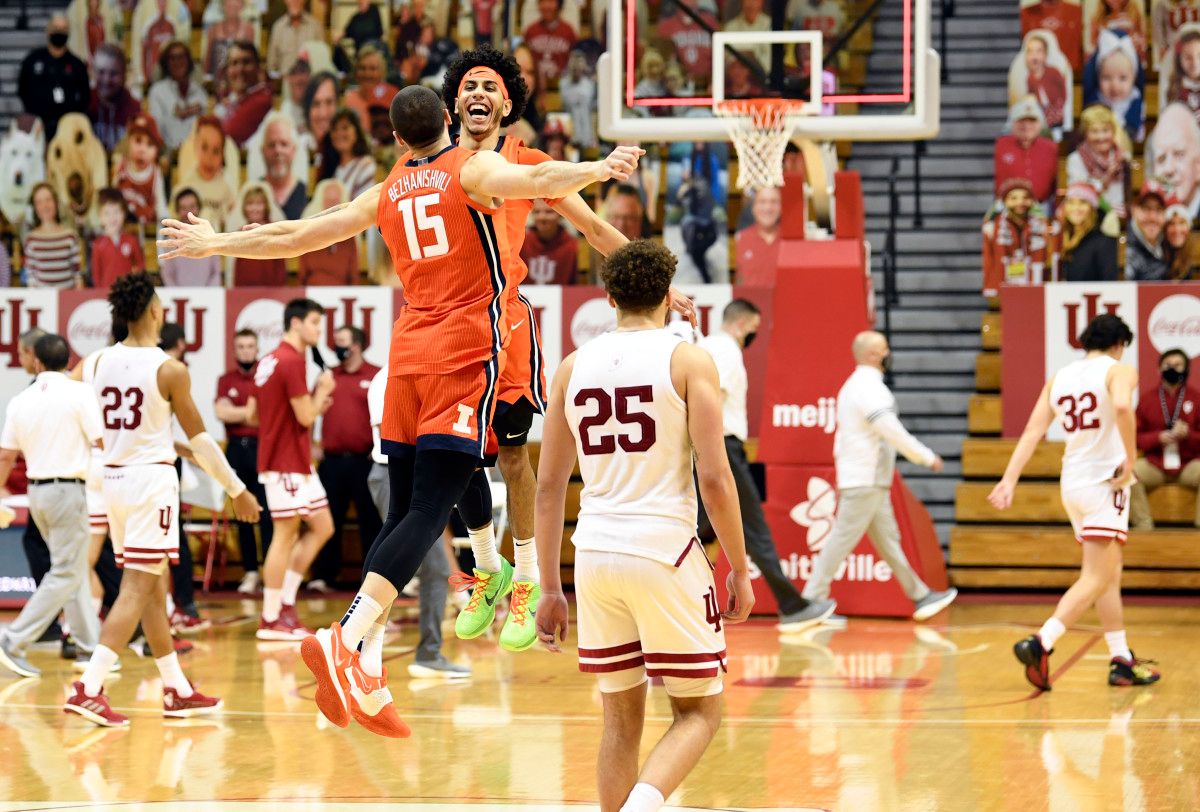 Illinois Fighting Illini guard Andre Curbelo (5) and forward Giorgi Bezhanishvili (15) celebrate on the court after defeating the Indiana Hoosiers at Simon Skjodt Assembly Hall.
