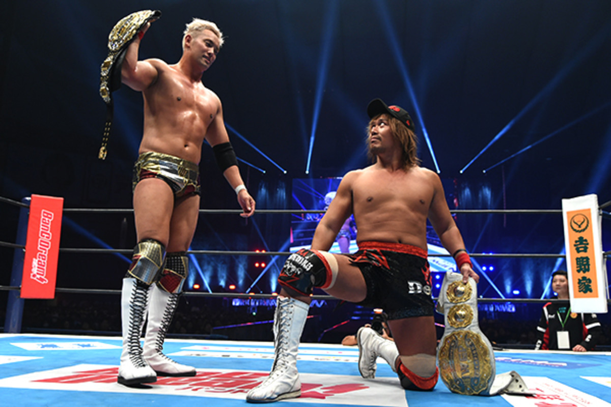 NJPW's Kazuchika Okada and Tetsuya Naito in the ring with their championship belts