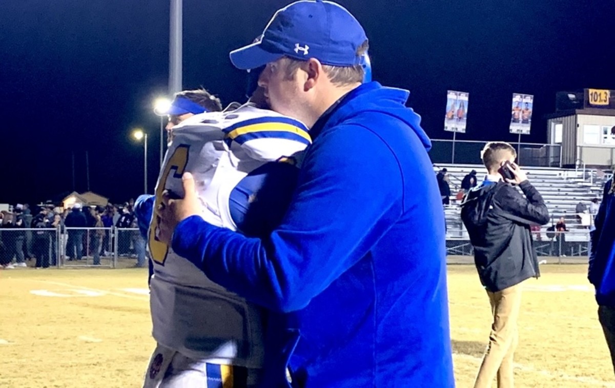 Westview coach Jarod Neal embraced his quarterback, Ty Simpson, after the Chargers’ season ended in a 21-17 loss in Medina, Tenn., on November 13, 2020.