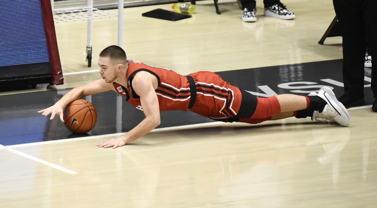 Jan 21, 2021; Pullman, Washington, USA; Utah Utes guard Rylan Jones (15) tries to save the ball from going out of bounds in a game against the Washington State Cougars during the first half of a Pac-12 men s basketball game at Friel Court at Beasley Coliseum.