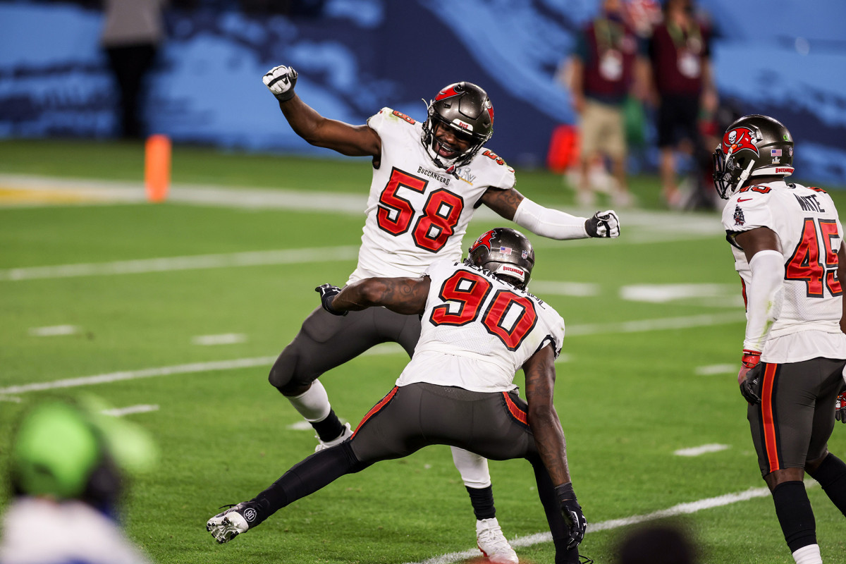 Bucs teammates Shaq Barrett and Jason Pierre-Paul celebrate a sack during Super Bowl LV