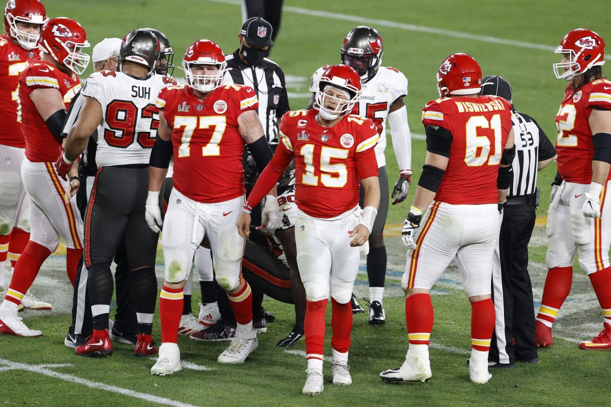 Feb 7, 2020; Tampa, FL, USA; Kansas City Chiefs quarterback Patrick Mahomes (15) reacts after being hit against the Tampa Bay Buccaneers during the fourth quarter of Super Bowl LV at Raymond James Stadium. Mandatory Credit: Kim Klement-USA TODAY Sports