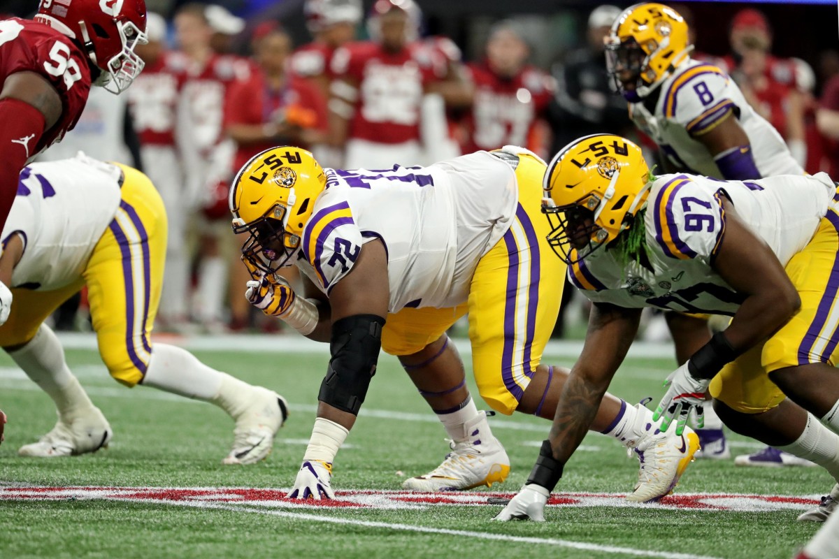 Dec 28, 2019; Atlanta, Georgia, USA; LSU Tigers nose tackle Tyler Shelvin (72) shown before a defensive snap during the 2019 Peach Bowl college football playoff semifinal game between the LSU Tigers and the Oklahoma Sooners at Mercedes-Benz Stadium.