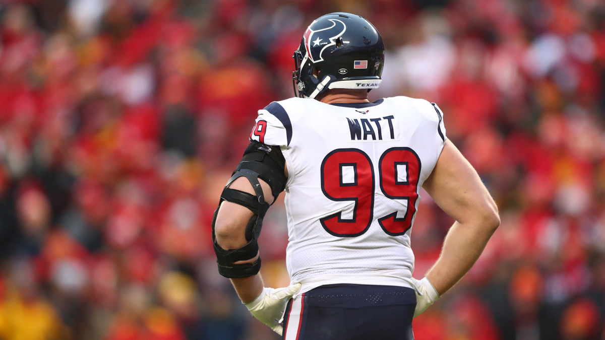 J.J. Watt, with his back to the camera, between plays