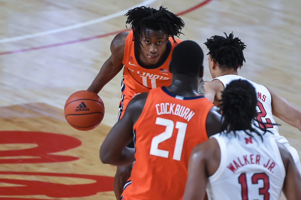Illinois Fighting Illini guard Ayo Dosunmu (11) dribbles the ball against Nebraska Cornhuskers guard Trey McGowens (2) in the first half at Pinnacle Bank Arena.
