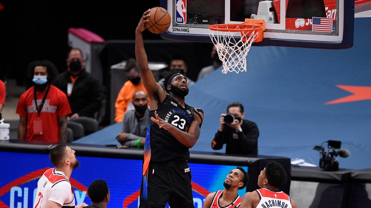 Mitchell Robinson goes for a dunk against the Wizards on Feb. 12, 2021.