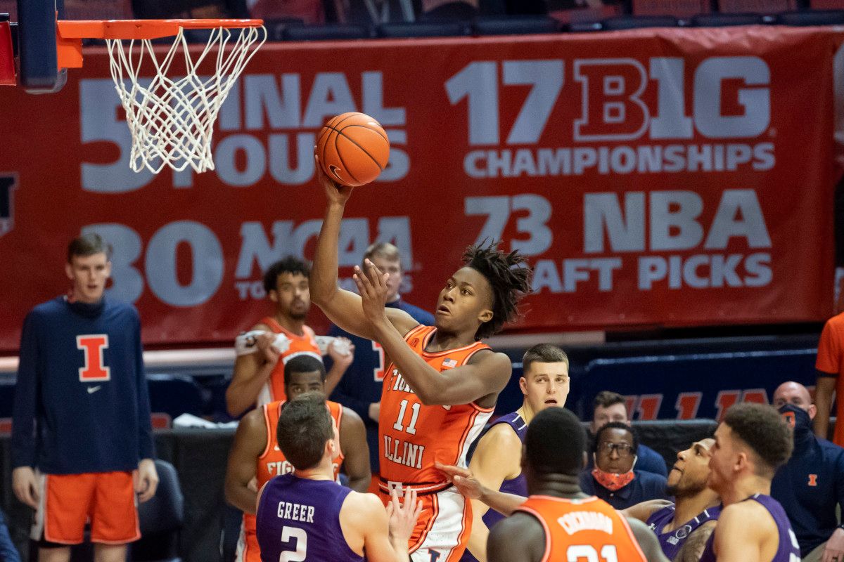 Illinois Fighting Illini guard Ayo Dosunmu (11) shoots against the Northwestern Wildcats during the second half at the State Farm Center.