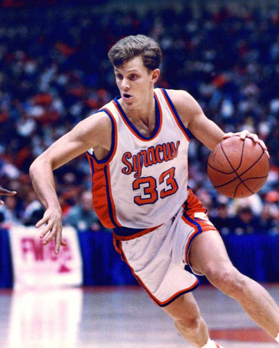 Mike Hopkins, with a head of hair, as a shooting guard at Syracuse.