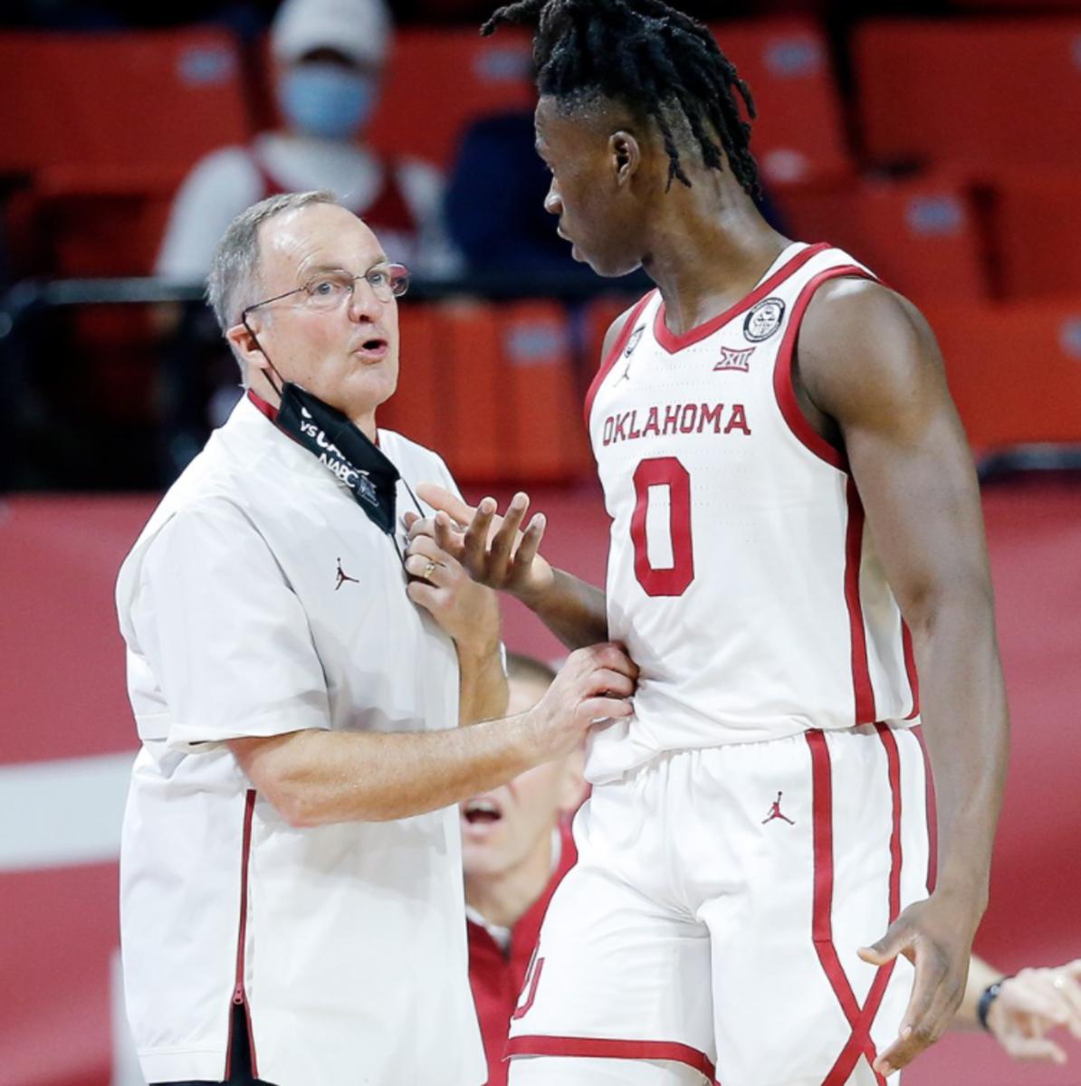 Lon Kruger and Victor Iwuakor