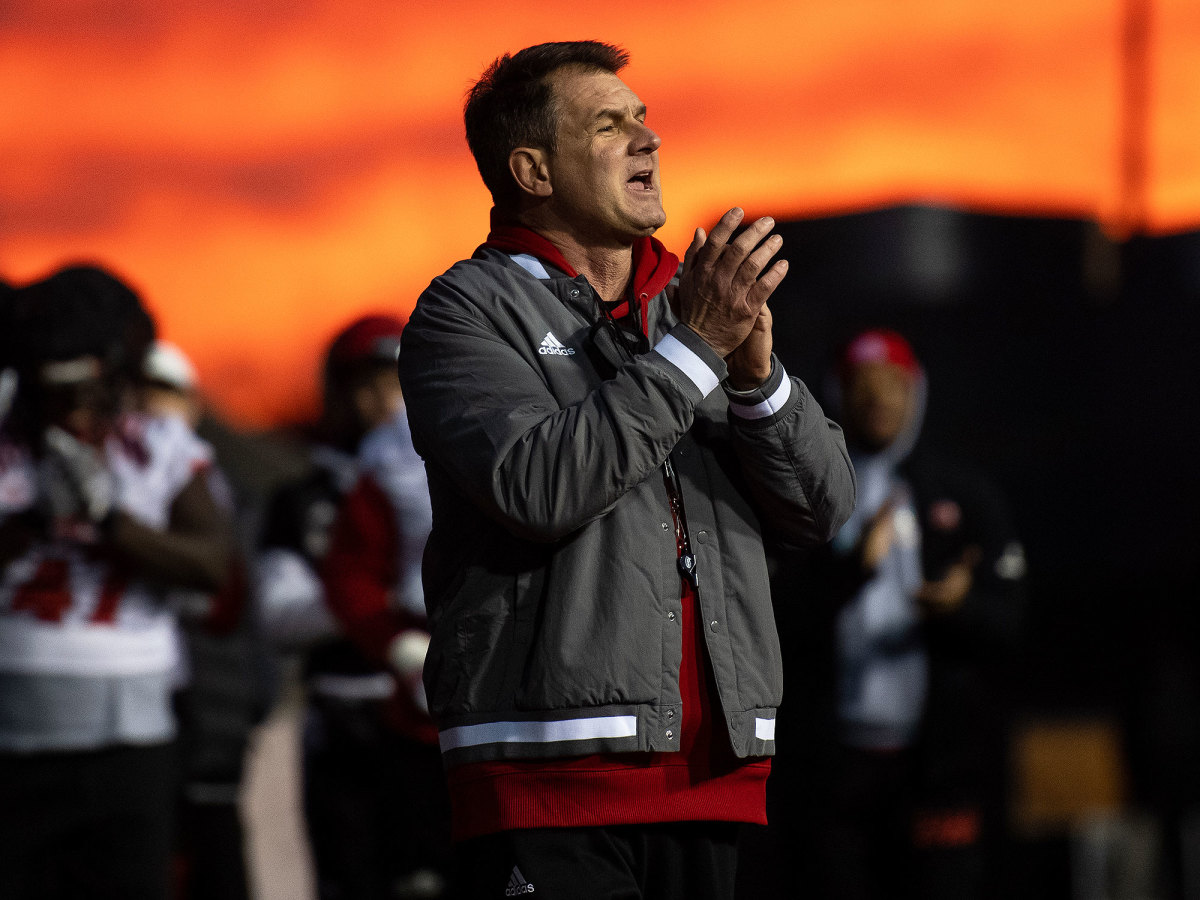 Jacksonville State coach John Grass claps during practice