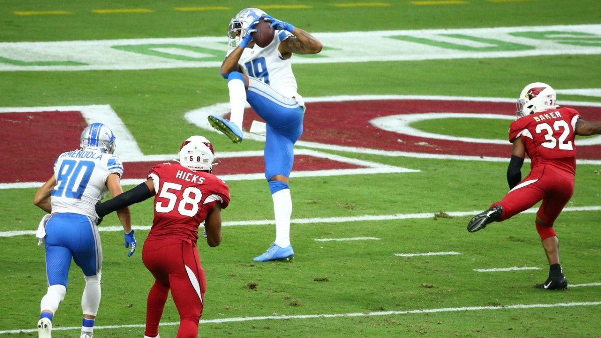 Golladay makes a touchdown catch over Arizona Cardinals strong safety Budda Baker. 