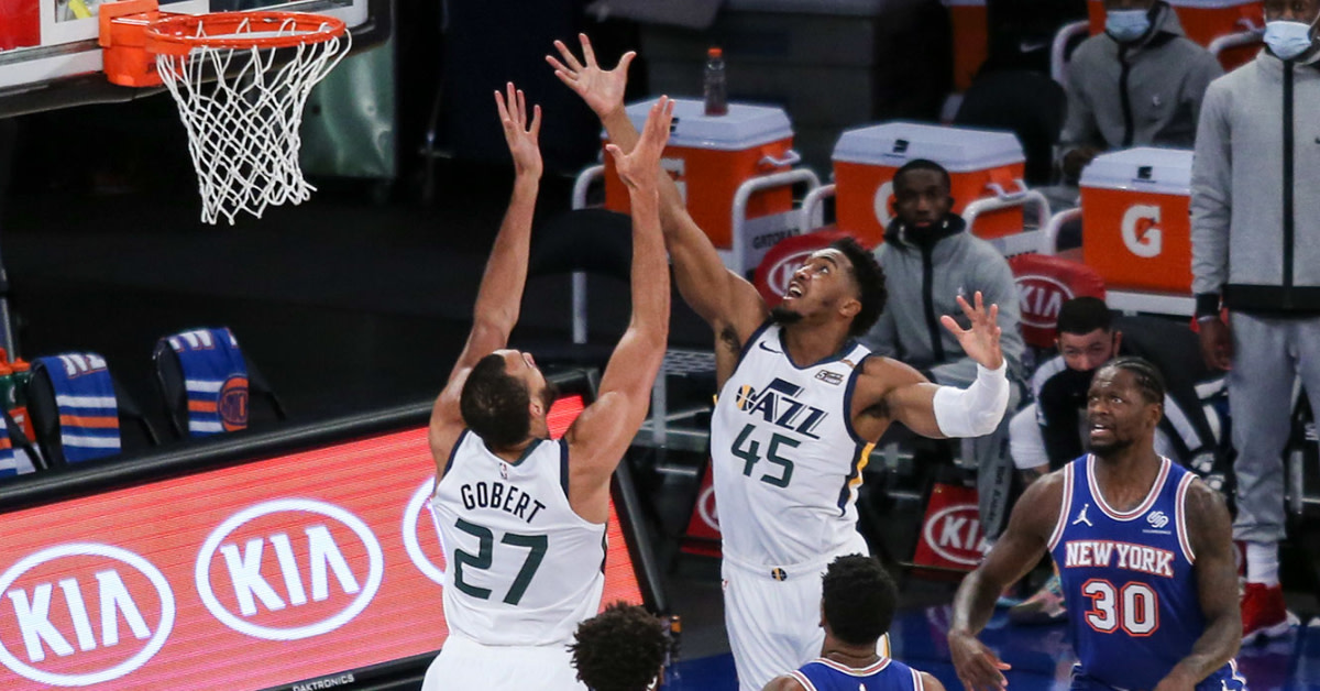 Jan 6, 2021; New York, New York, USA; Utah Jazz guard Donovan Mitchell (45) and center Rudy Gobert (27) go for a rebound against New York Knicks guard Elfrid Payton (6) and center Mitchell Robinson (23) during the first half at Madison Square Garden. Mandatory Credit: Wendell Cruz-USA TODAY Sports