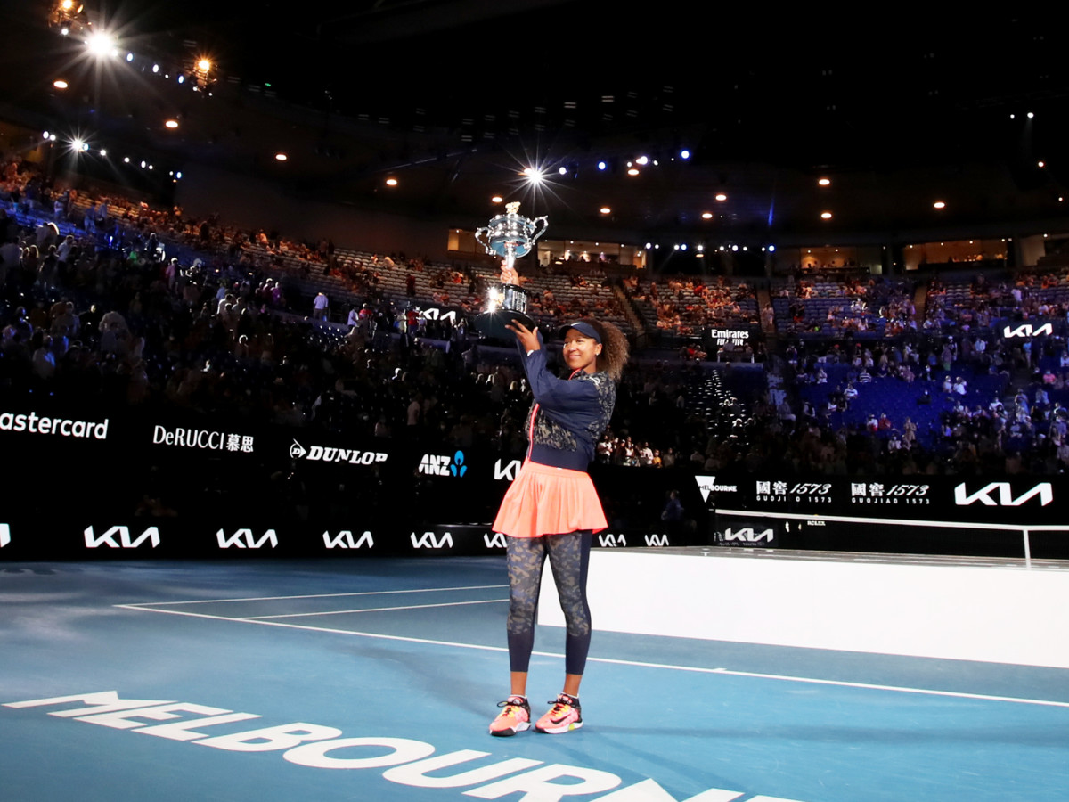 Naomi Osaka celebrates after winning the 2021 Australian Open over Jennifer Brady.