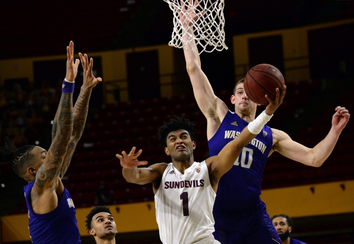 Remy White of ASU goes for two of his 31 points.
