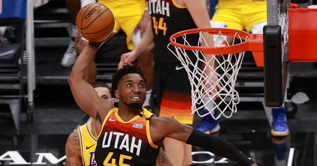 Utah Jazz guard Donovan Mitchell dunks the basketball