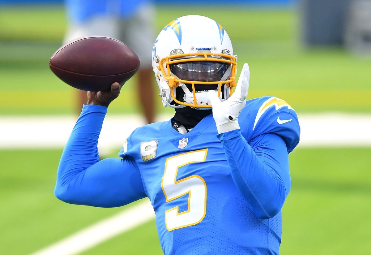 Los Angeles Chargers quarterback Tyrod Taylor (5) warms up before a game against the New York Jets at SoFi Stadium.