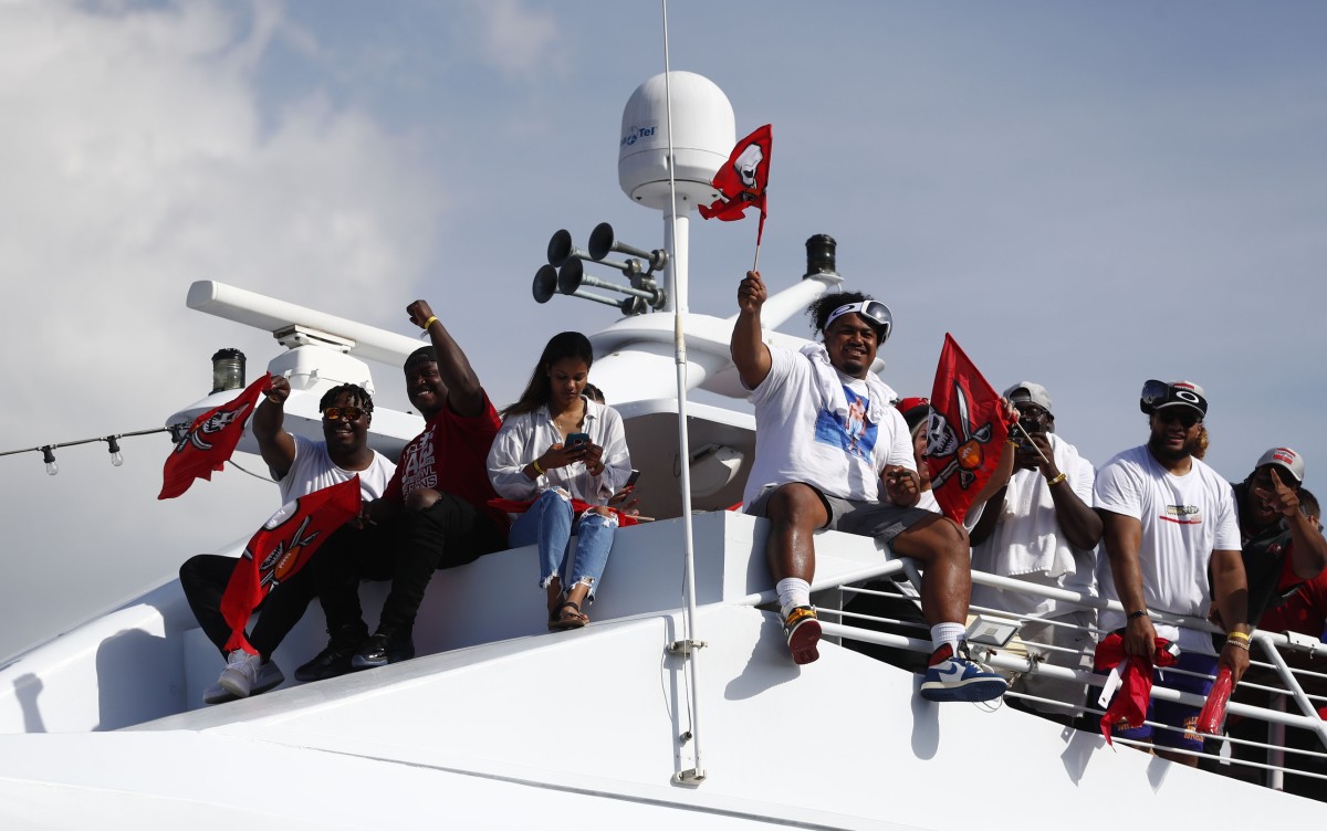 Vita Vea and his teammates took victory boat rides.
