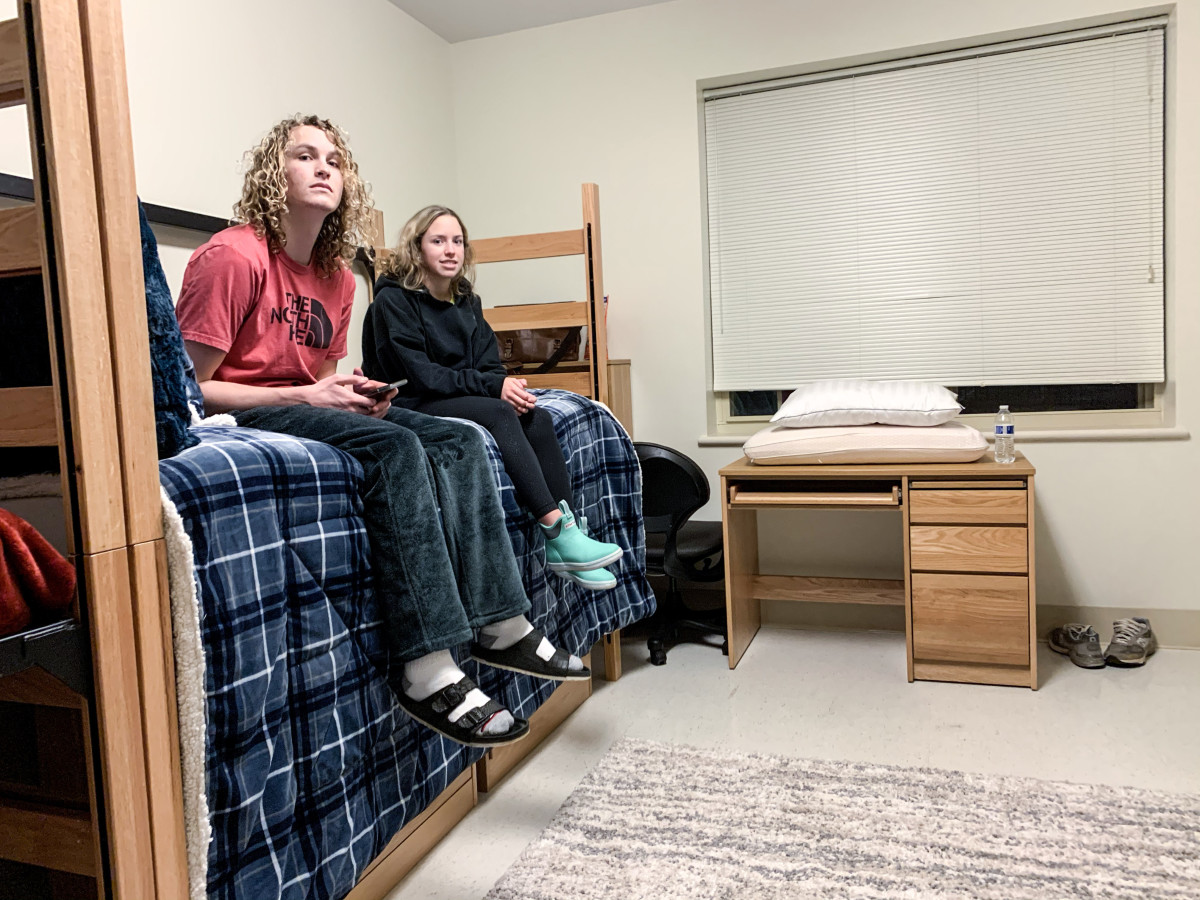 Alongside his sister, Whitt got comfortable in his dorm room on an empty campus. 