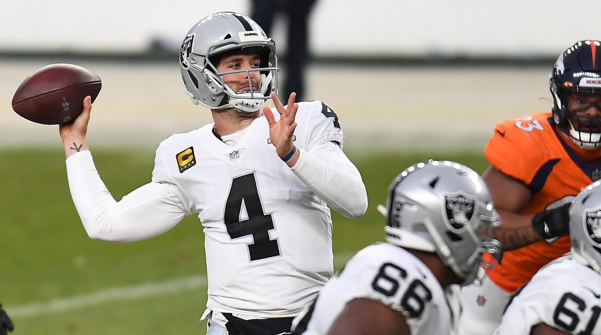 Jan 3, 2021; Denver, Colorado, USA; Las Vegas Raiders quarterback Derek Carr (4) throws a pass against the Denver Broncos during the second quarter at Empower Field at Mile High.