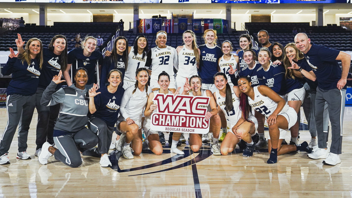 California Baptist women's basketball poses after winning the WAC regular-season title