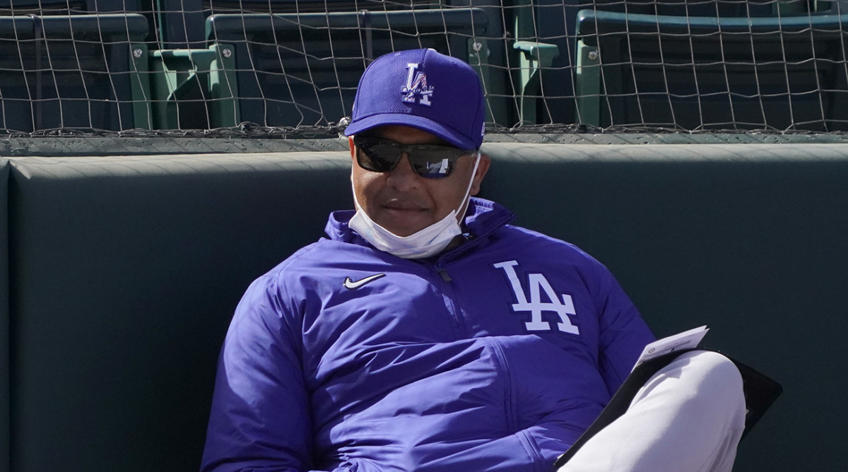 Dave Roberts watches a spring training game
