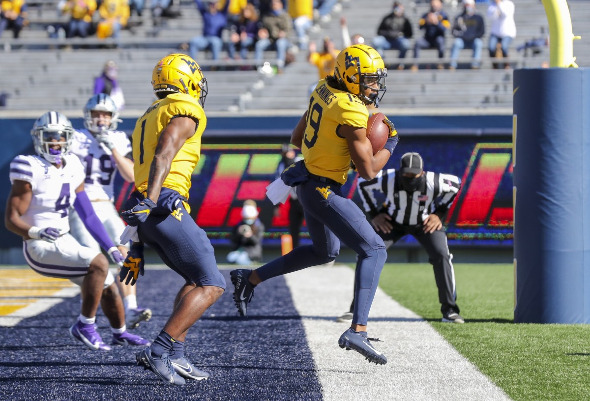 Oct 31, 2020; Morgantown, West Virginia, USA; West Virginia Mountaineers wide receiver Ali Jennings (19) catches a pass for a touchdown during the second quarter against the Kansas State Wildcats at Mountaineer Field at Milan Puskar Stadium.