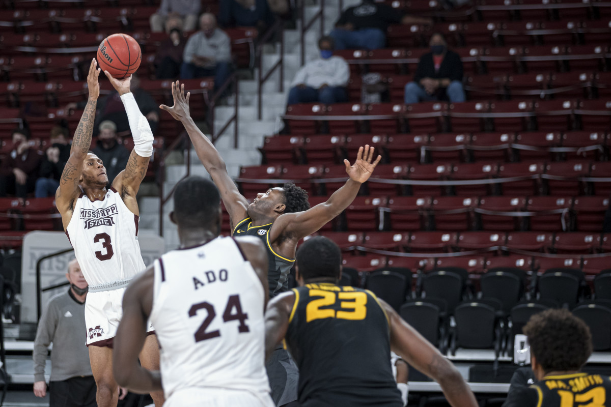 D.J. Stewart, Jr., No. 3, shoots as Abdul Ado, No. 24, looks on during a game earlier this season. (Photo courtesy of Mississippi State athletics)