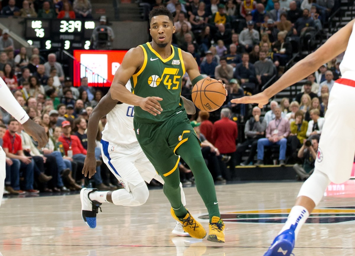 Donovan Mitchell (45) wears the 2019 'Earned Edition' uniform against the Los Angeles Clippers