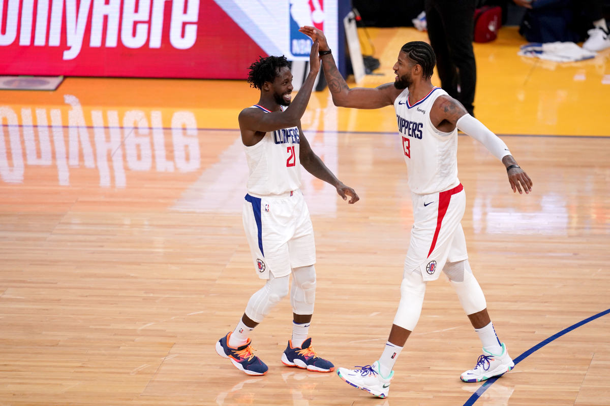 Jan 6, 2021; San Francisco, California, USA; Los Angeles Clippers guard Patrick Beverley (21) and forward Paul George (13) react after the Golden State Warriors were called for a foul in the fourth quarter at the Chase Center. Mandatory Credit: Cary Edmondson-USA TODAY Sports