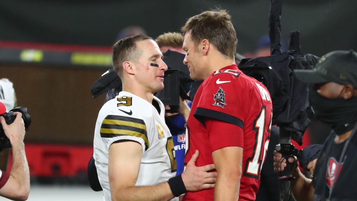 Tom Brady and Drew Brees meet on field following a game