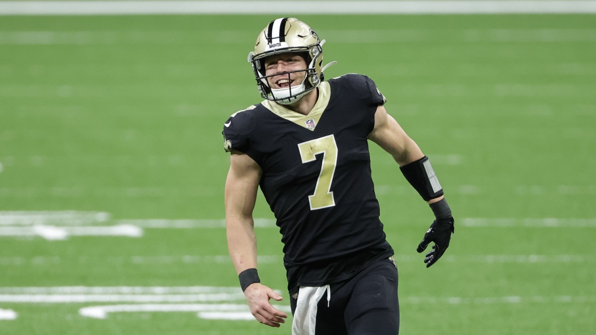 Saints' Taysom Hill celebrates after a big play on the field