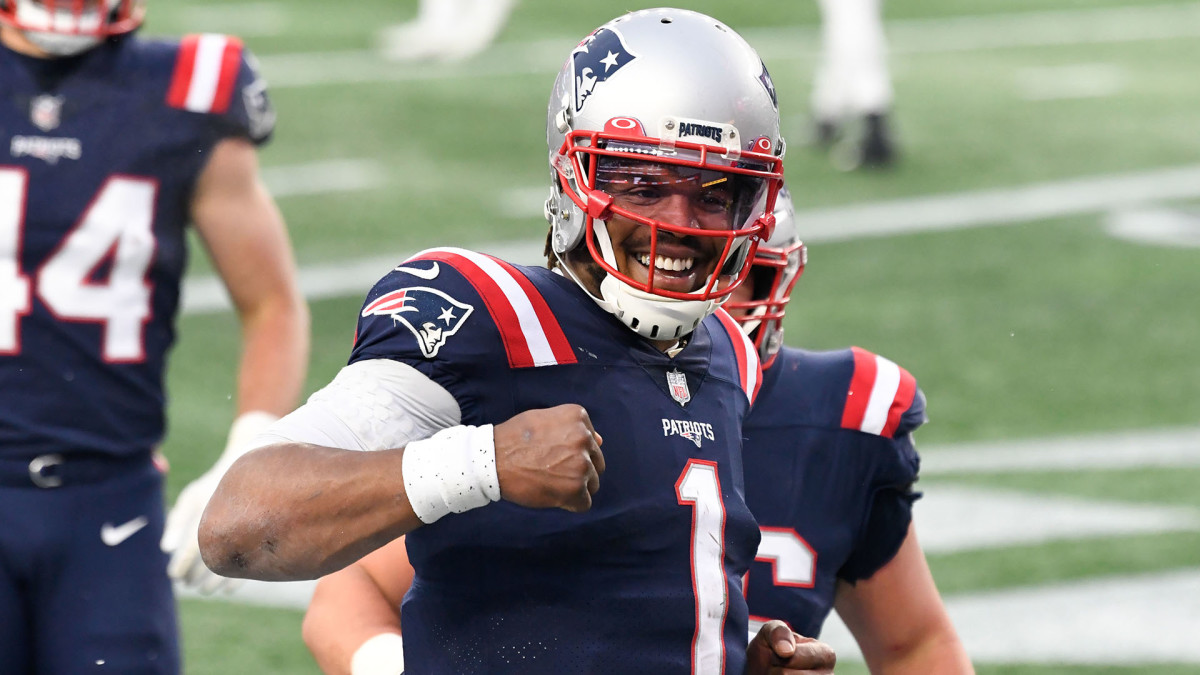 Cam Newton celebrates a touchdown for the Patriots in the final game of the 2020 season.