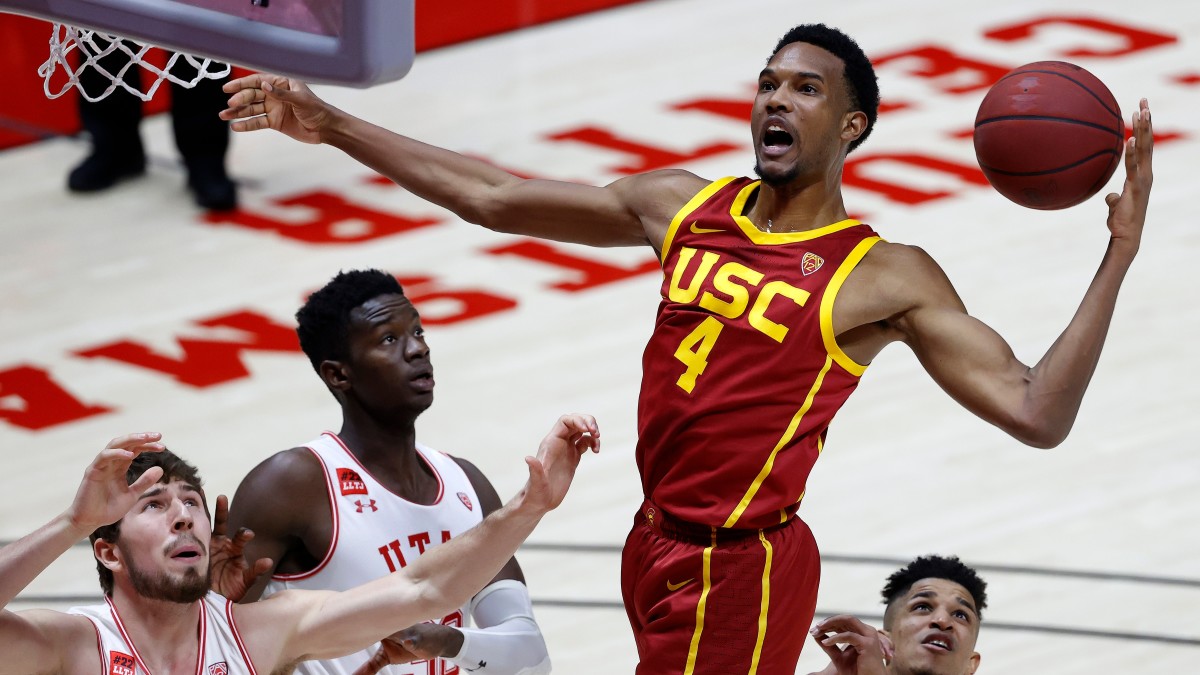 Evan Mobley grabs a rebound against Utah on Feb. 27.