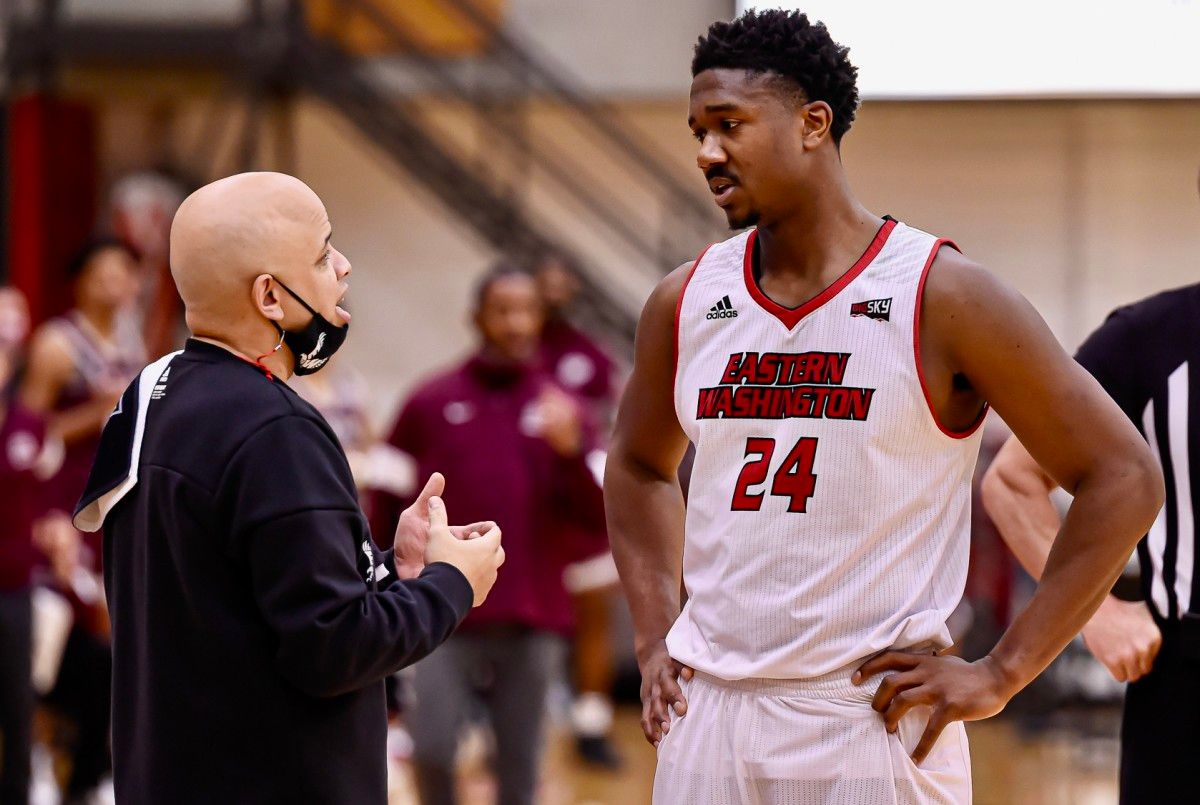 Shantay Legans talks with junior guard Kim Aiken