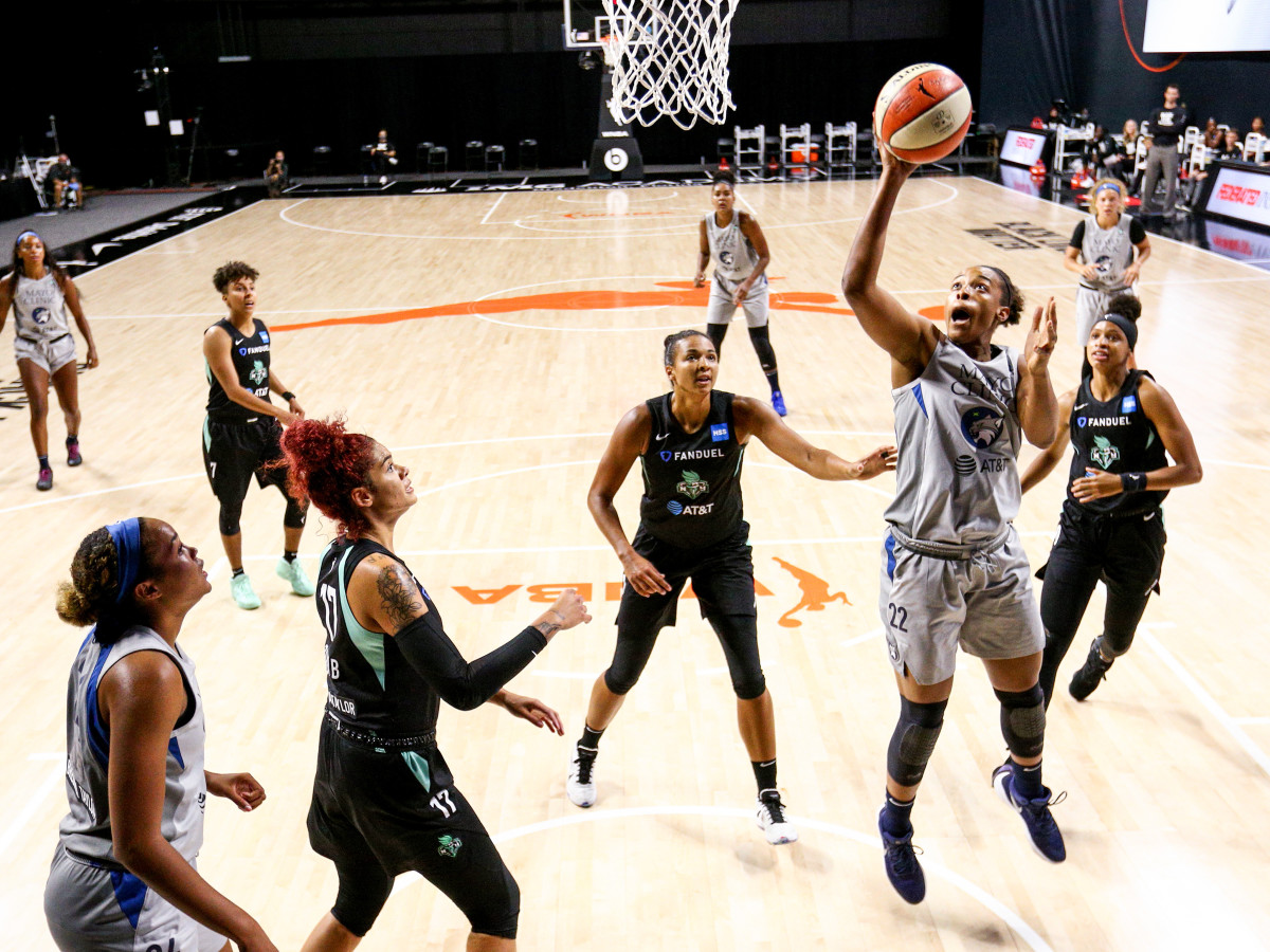 Erica McCall throws up a shot