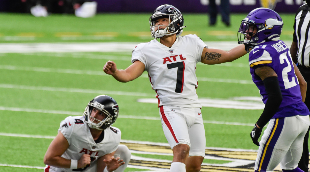 Younghoe Koo kicks a field goal.