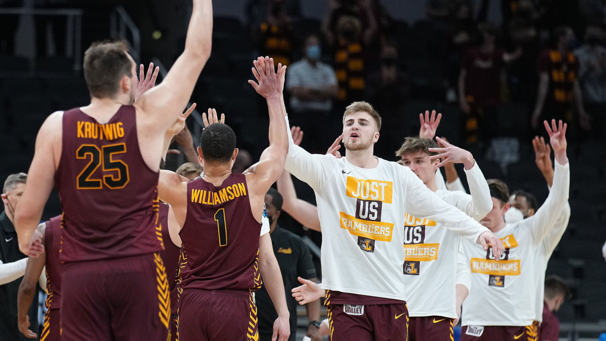 Loyola Chicago celebrates after a win over Illinois