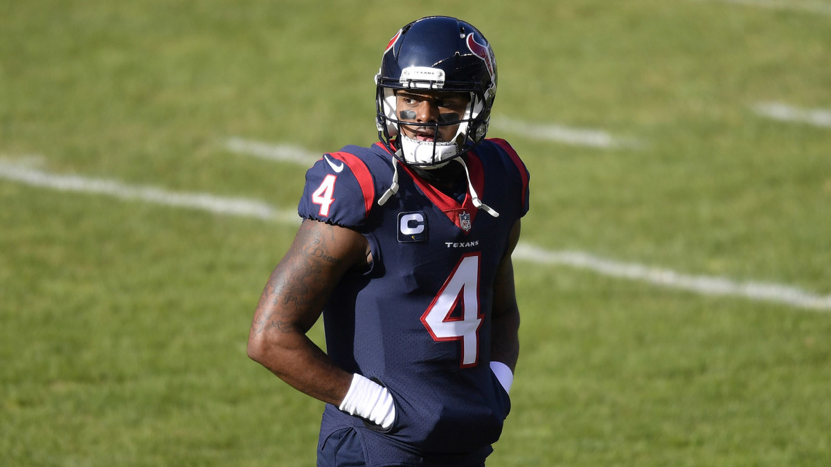 Deshaun Watson walks off the field during a game against the Bears