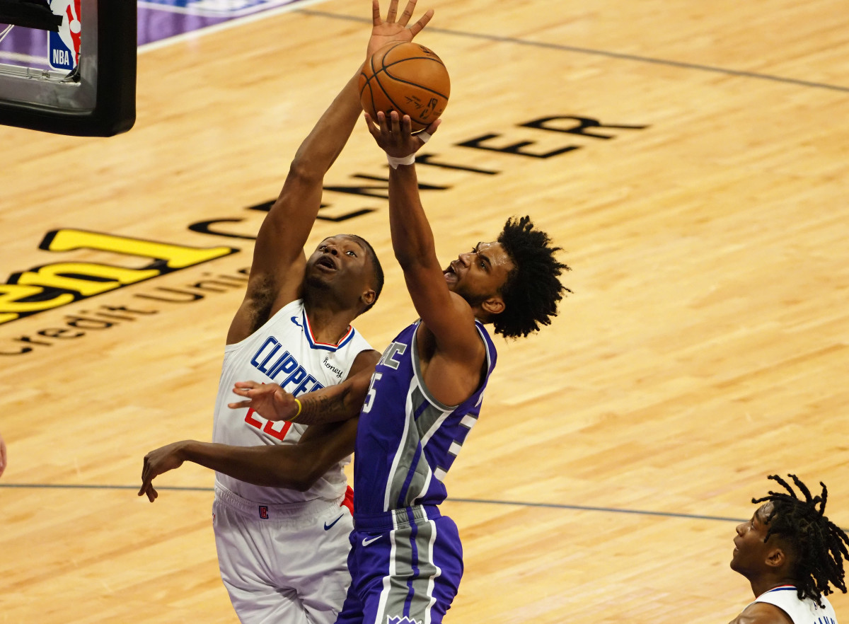 Jan 15, 2021; Sacramento, California, USA; Sacramento Kings forward Marvin Bagley III (35) shoots against Los Angeles Clippers forward-center Mfiondu Kabengele (25) during the fourth quarter at Golden 1 Center. Mandatory Credit: Kelley L Cox-USA TODAY Sports