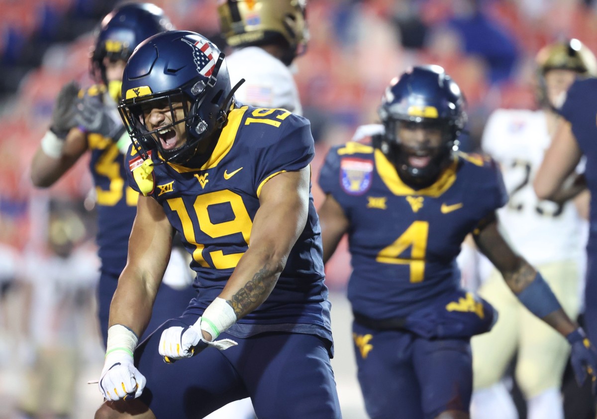 West Virginia Mountaineers defender Scottie Young celebrates a stop on third down against the Army Black Knights during the AutoZone Liberty Bowl in Memphis, Tenn. on Thursday, Dec. 31, 2020.