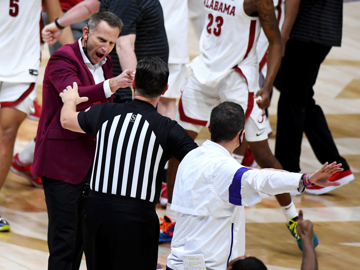 Nate Oats shouts at LSU coach Will Wade after Alabama defeated the Tigers in the SEC championship game on March 14. 2021.