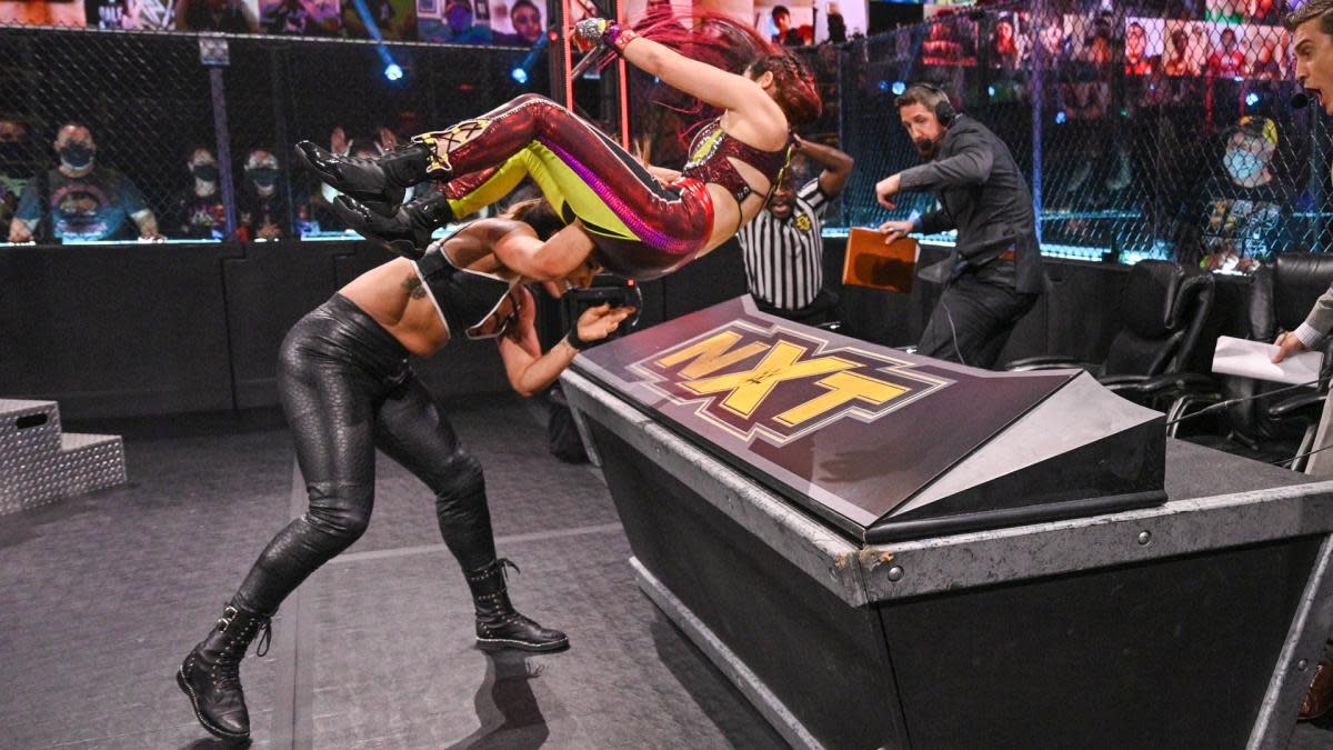 WWE's Raquel Gonzalez throws Io Shirai through a table on NXT