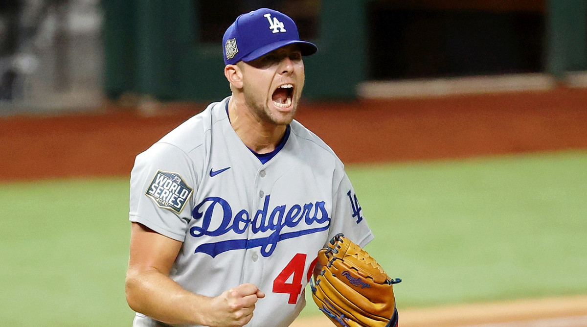 Blake Treinen celebrates after a strikeout.