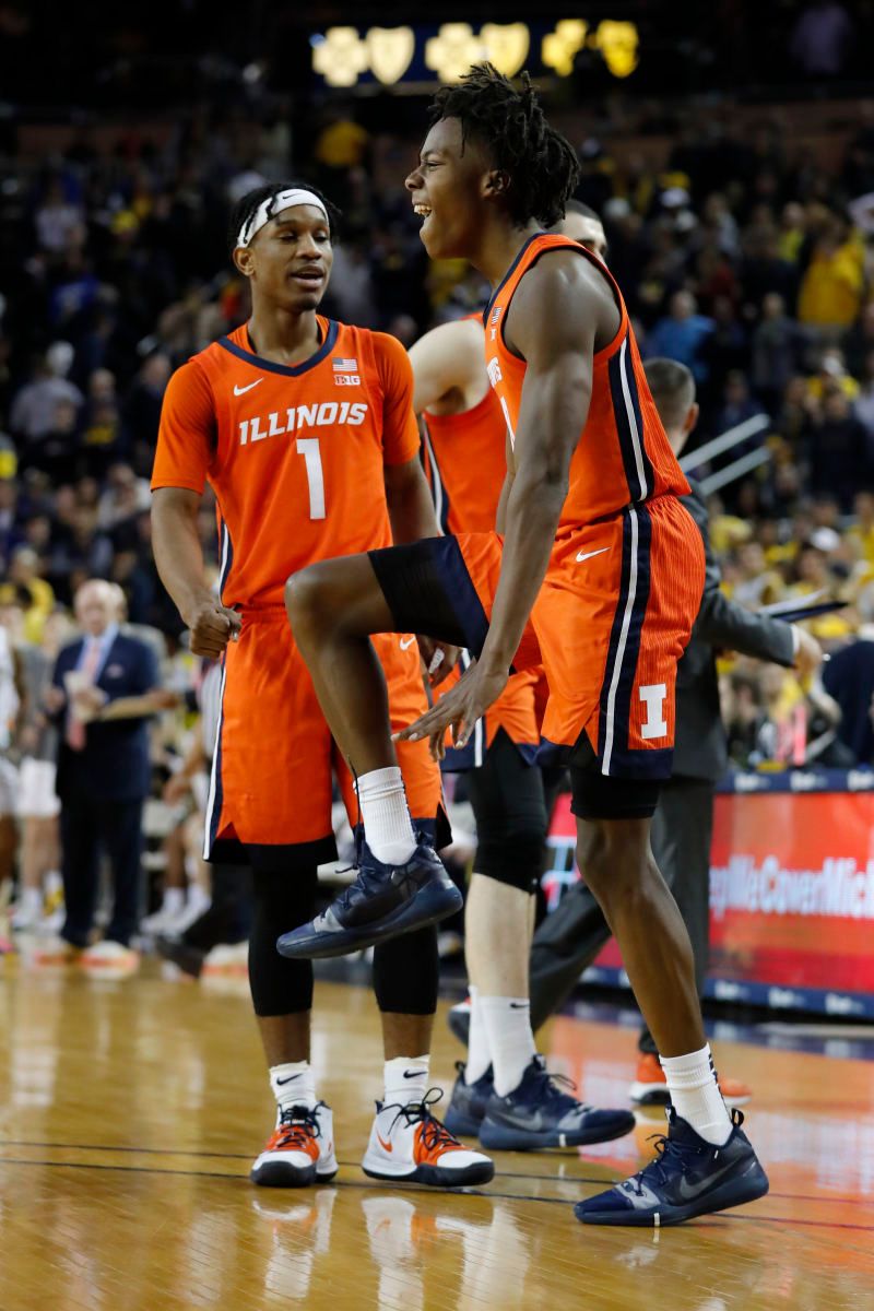 Illinois Fighting Illini guard Ayo Dosunmu (11) and guard Trent Frazier (1) celebrates during the second half against the Michigan Wolverines at Crisler Center.