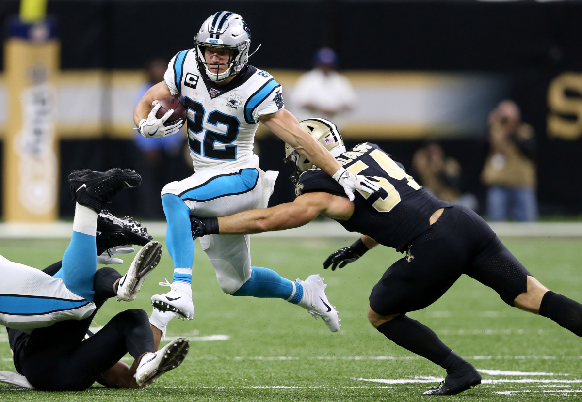 Nov 24, 2019; New Orleans, LA, USA; Carolina Panthers running back Christian McCaffrey (22) is defended by New Orleans Saints outside linebacker Kiko Alonso (54) in the second quarter at the Mercedes-Benz Superdome. Mandatory Credit: Chuck Cook-USA TODAY Sports