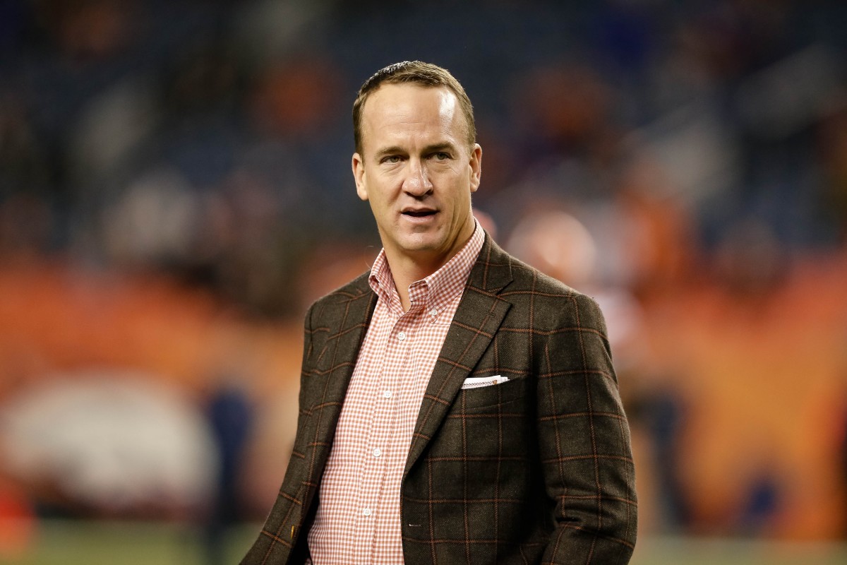 Former Denver Broncos player Peyton Manning before the game against the Cleveland Browns at Broncos Stadium at Mile High.